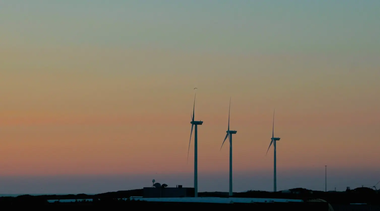 silhouette of wind turbines